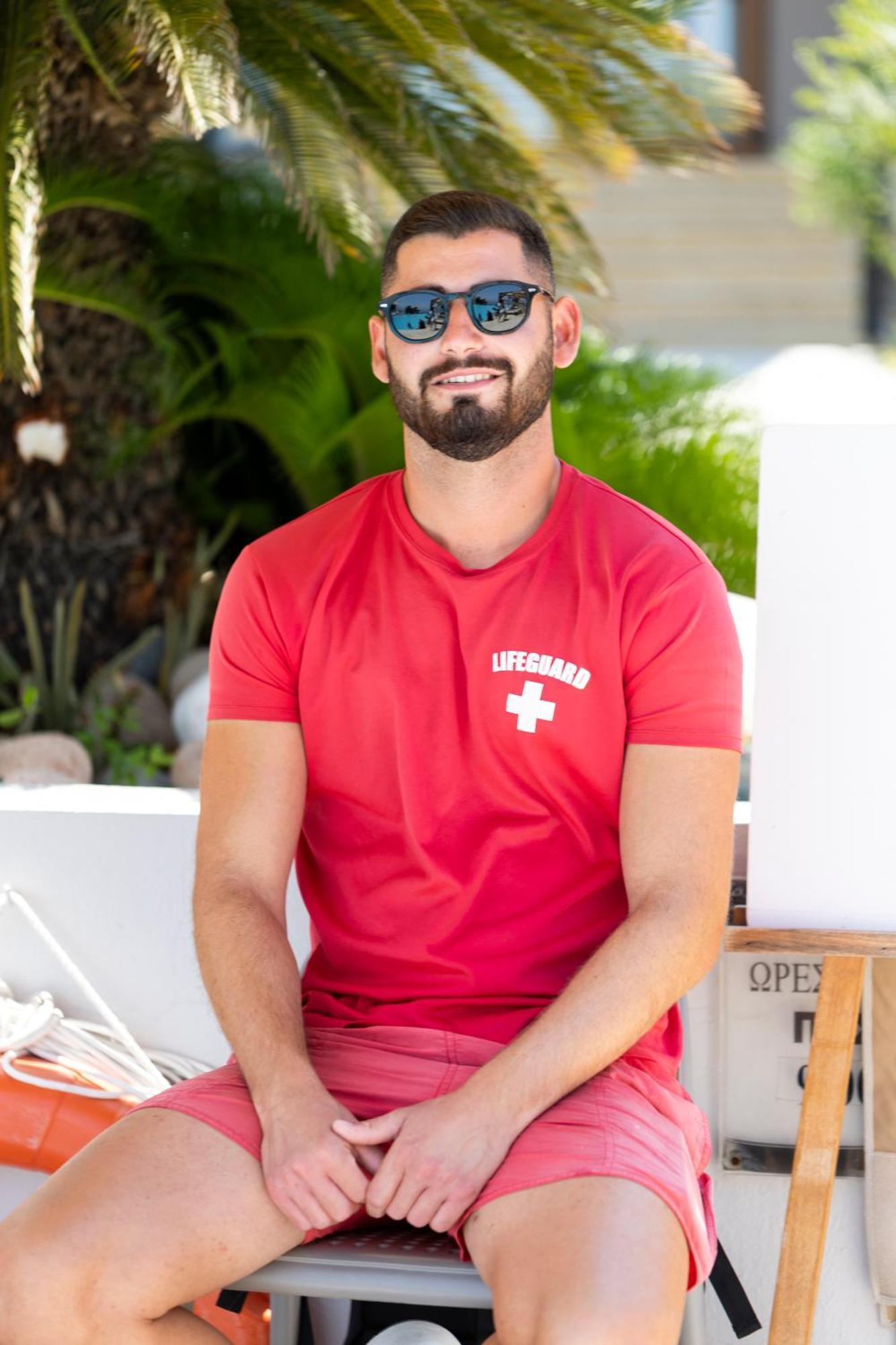 Alia Palace Hotel - Adults Only 16+ Chalkidiki Exterior photo A lifeguard in Miami Beach, Florida