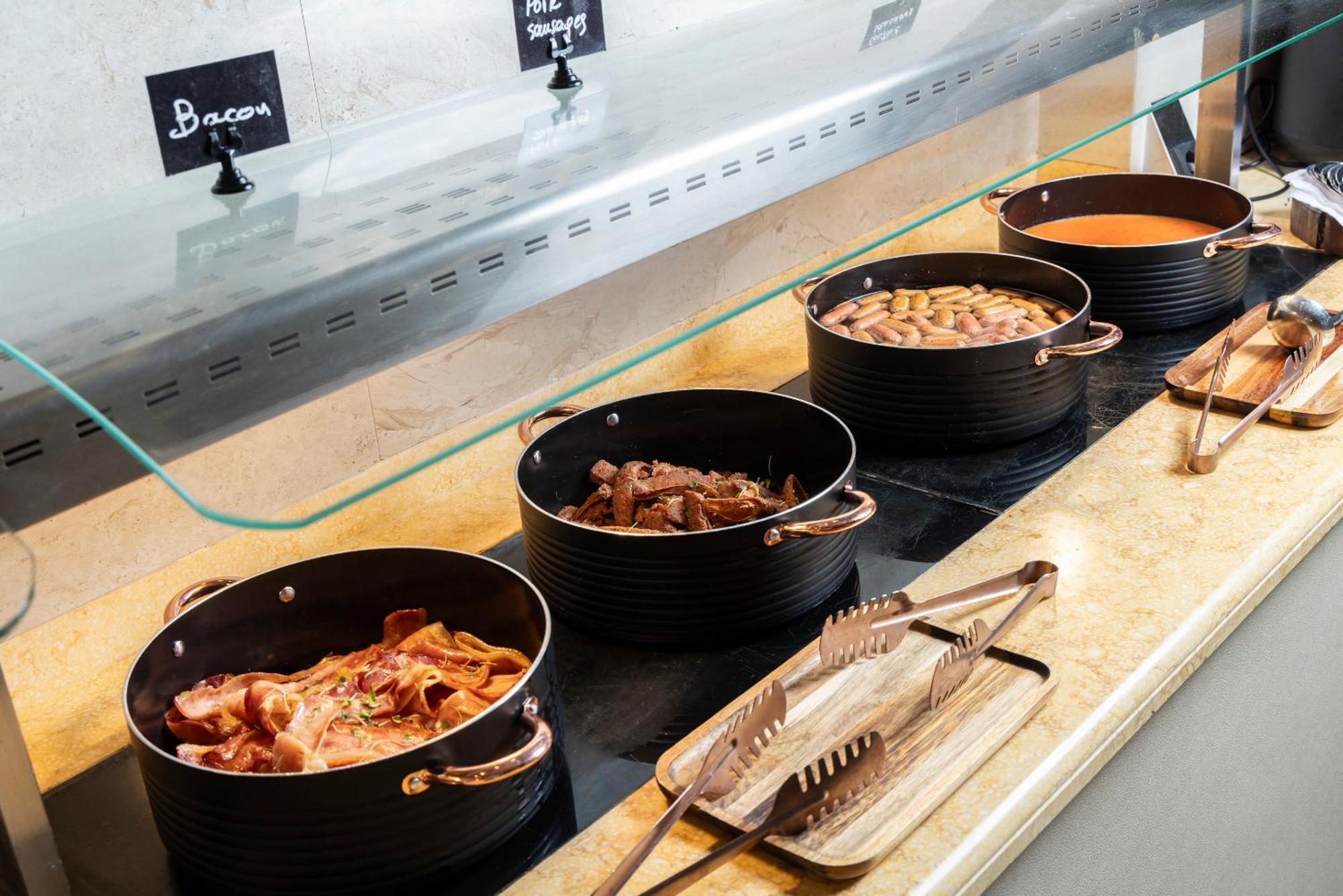 Alia Palace Hotel - Adults Only 16+ Chalkidiki Exterior photo Bacon, sausage, chicken and cheese at a salad bar