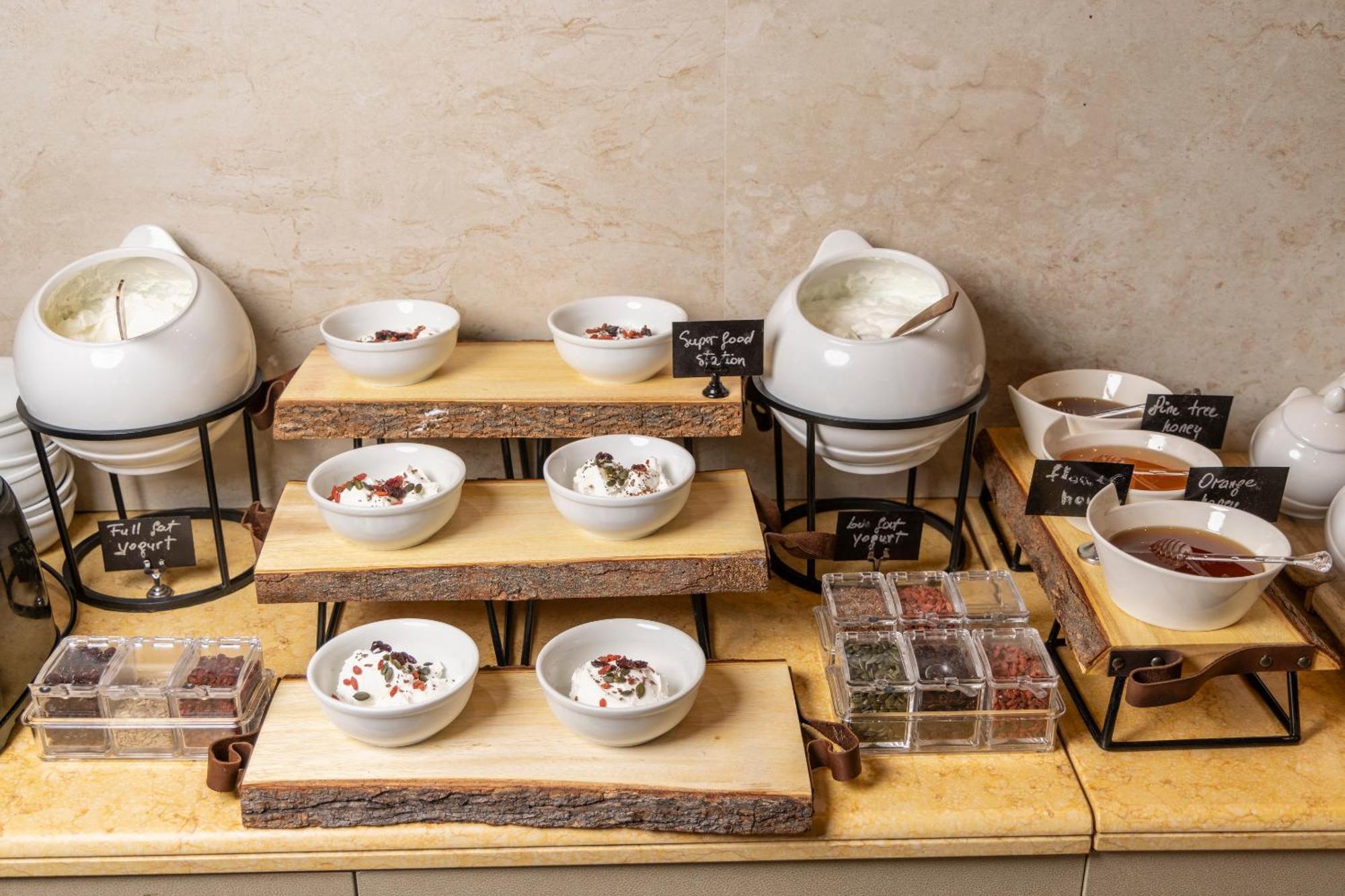 Alia Palace Hotel - Adults Only 16+ Chalkidiki Exterior photo A selection of teas at a buffet