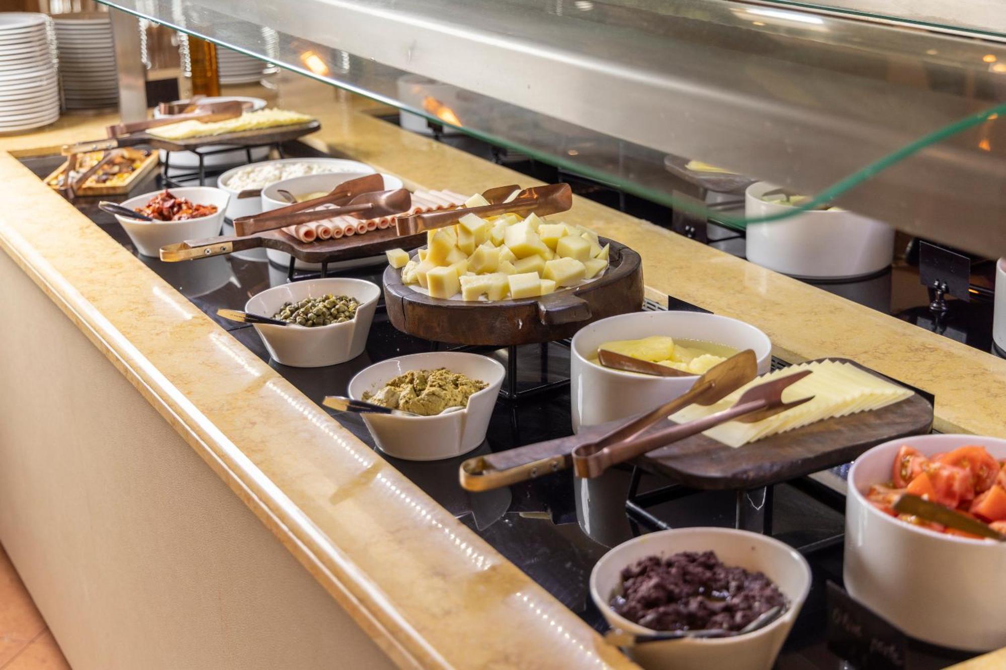 Alia Palace Hotel - Adults Only 16+ Chalkidiki Exterior photo A cheese platter